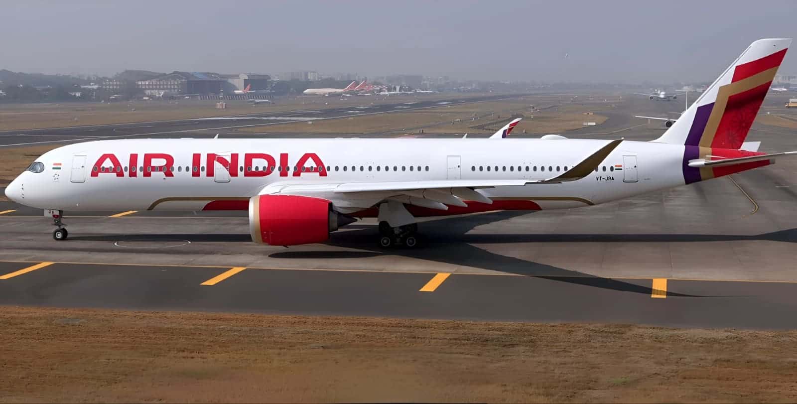 Air India Airbus A350-900 in the airline's post-Tata red, aubergine and gold livery