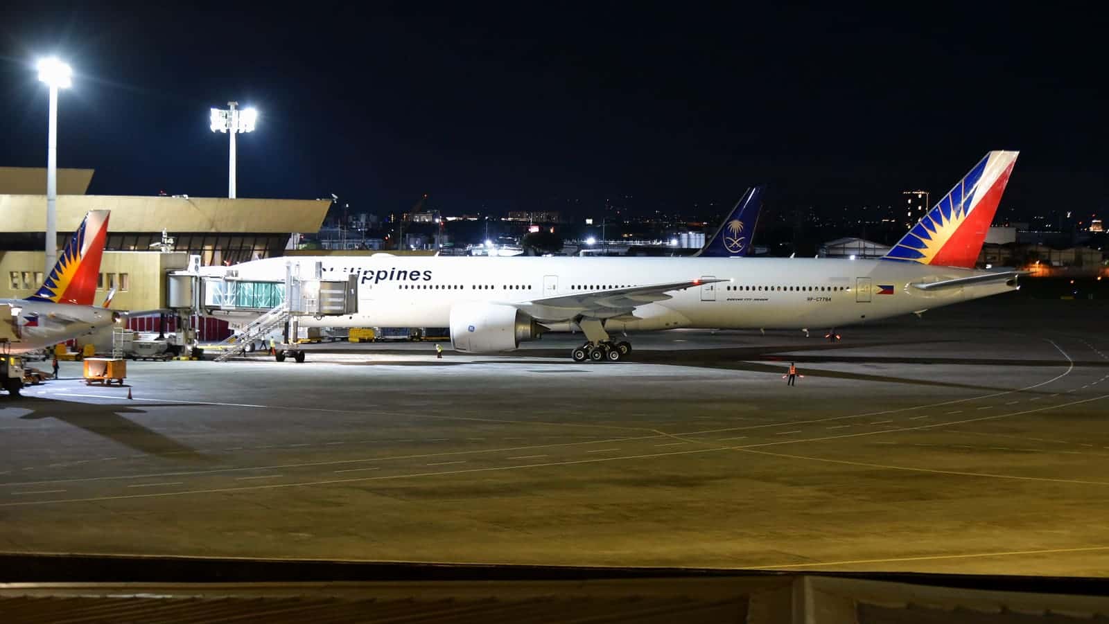 A Philippine Airlines Boeing 777 aircraft on the tarmac at Ninoy Aquino International Airport, Manila