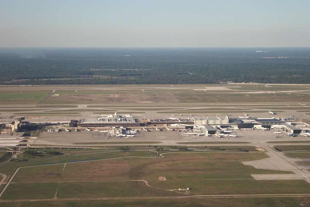Aerial view of Houston Intercontinental Airport's Terminals C, D, and E