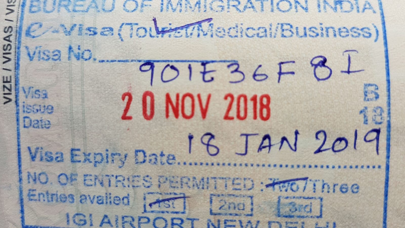An Indian e-Visa arrival stamp from the Bureau of Immigration at Delhi airport in a passport